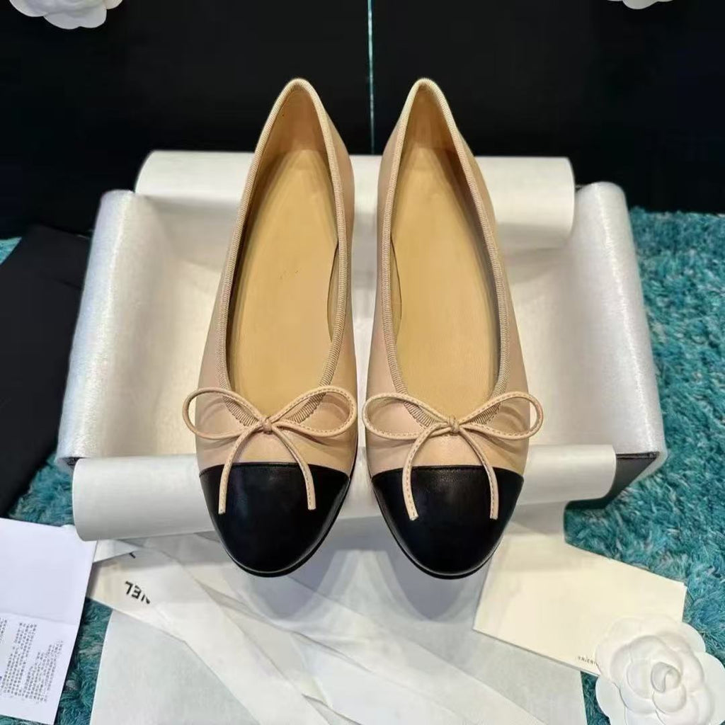 Flache Schuhe mit Schleife