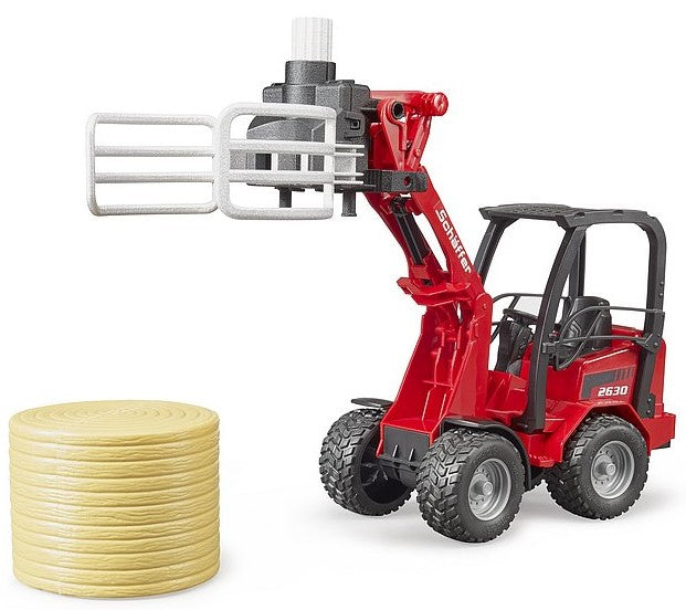 Schäffer Hoflader 2630 mit Ballengreifzange und 1 Rundballen