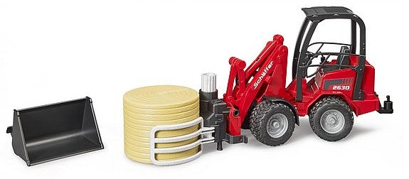 Schäffer Hoflader 2630 mit Ballengreifzange und 1 Rundballen