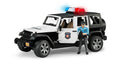 Jeep Wrangler Rubicon Unlimited Polizeifahrzeug mit Polizist