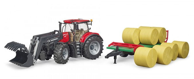 Case IH Optum 300CVX mit Frontlader und Ballentransportanhänger