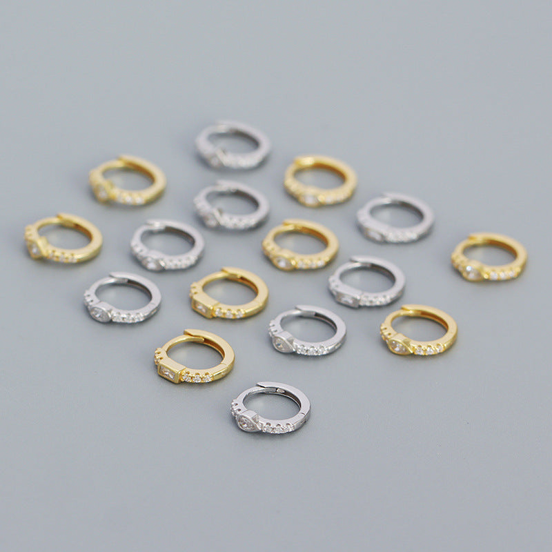 Diamantbesetzte Creolen