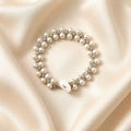 Armband mit grossen und kleinen Imitationsperlen