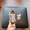 Lauflernschuhe mit Riemen, beige/silber