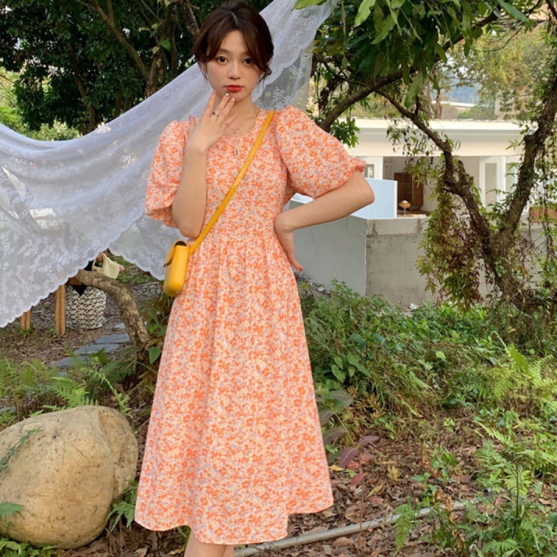 Oranges Midikleid mit Blumenprint und Puffärmeln – Bild 5 | LuxeStyle