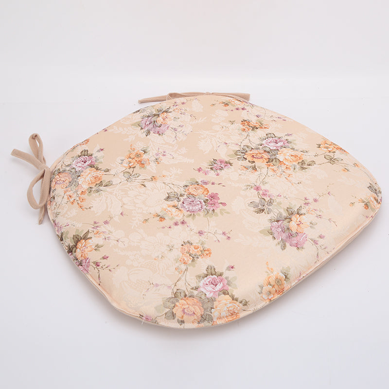 Kissen mit Blumenmuster und Bindegürtel