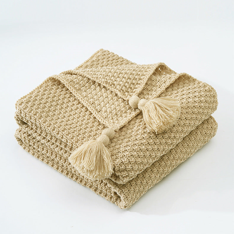 Nordische Strickdecke mit Quasten