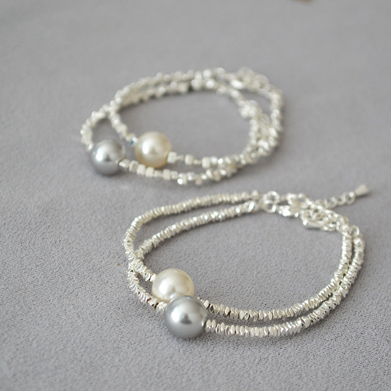 Minimalistisches Perlenarmband mit Silberelementen – Bild 5 | LuxeStyle