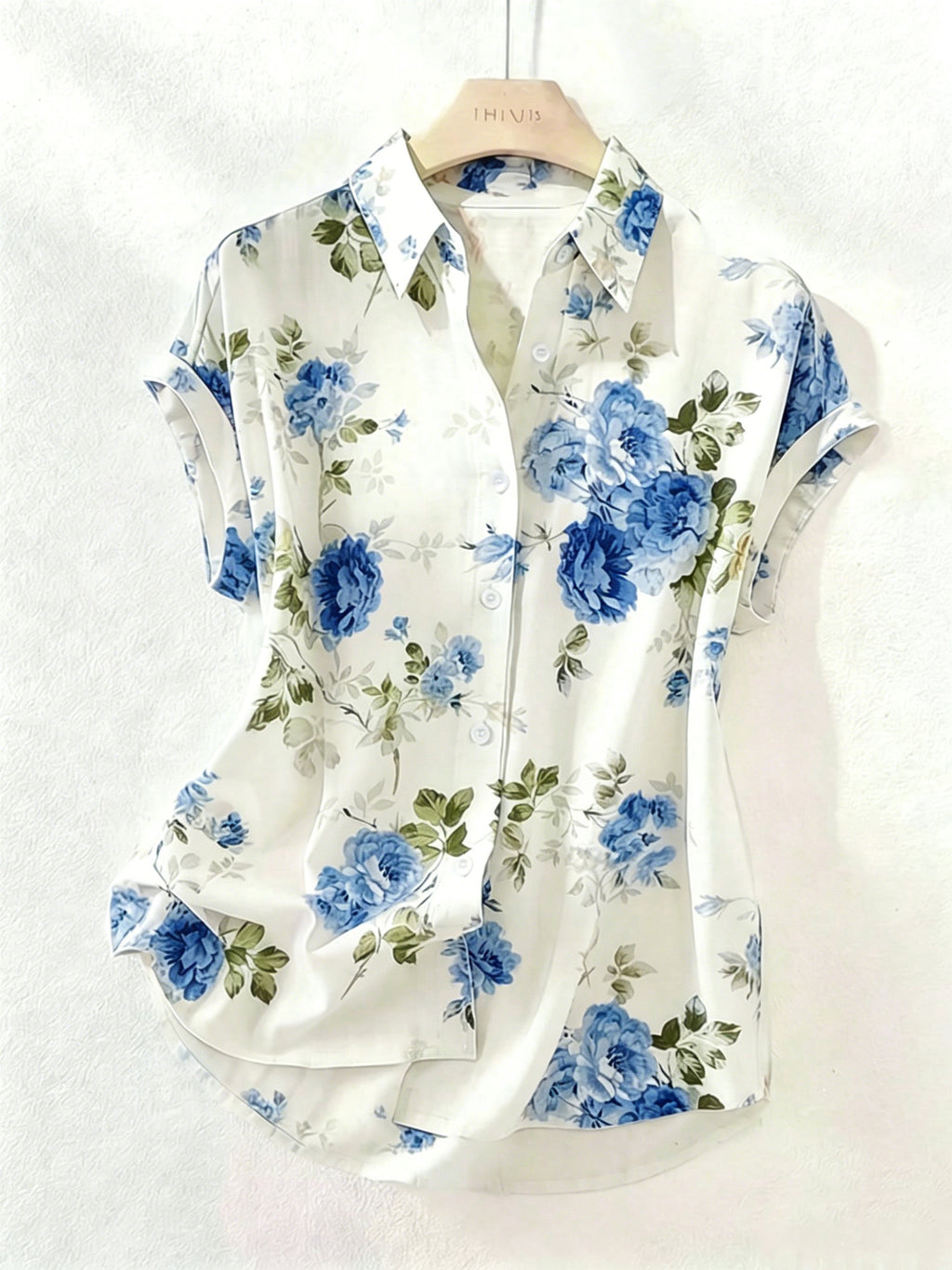 Bluse mit Blumenmuster und Reverskragen