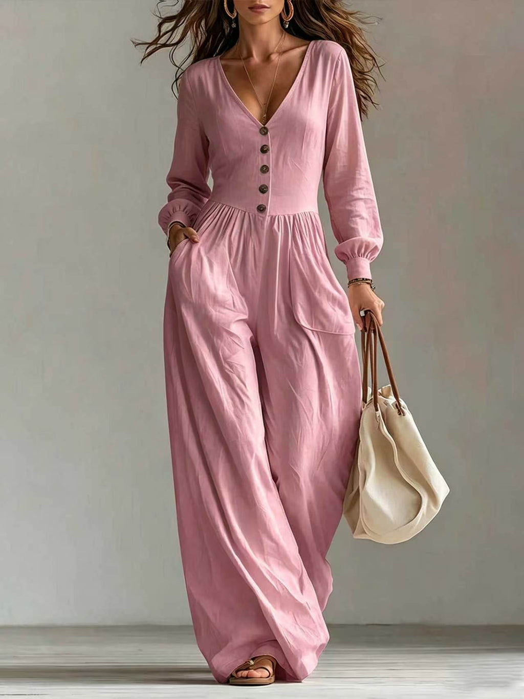 Eleganter Langarm-Jumpsuit mit weitem Bein