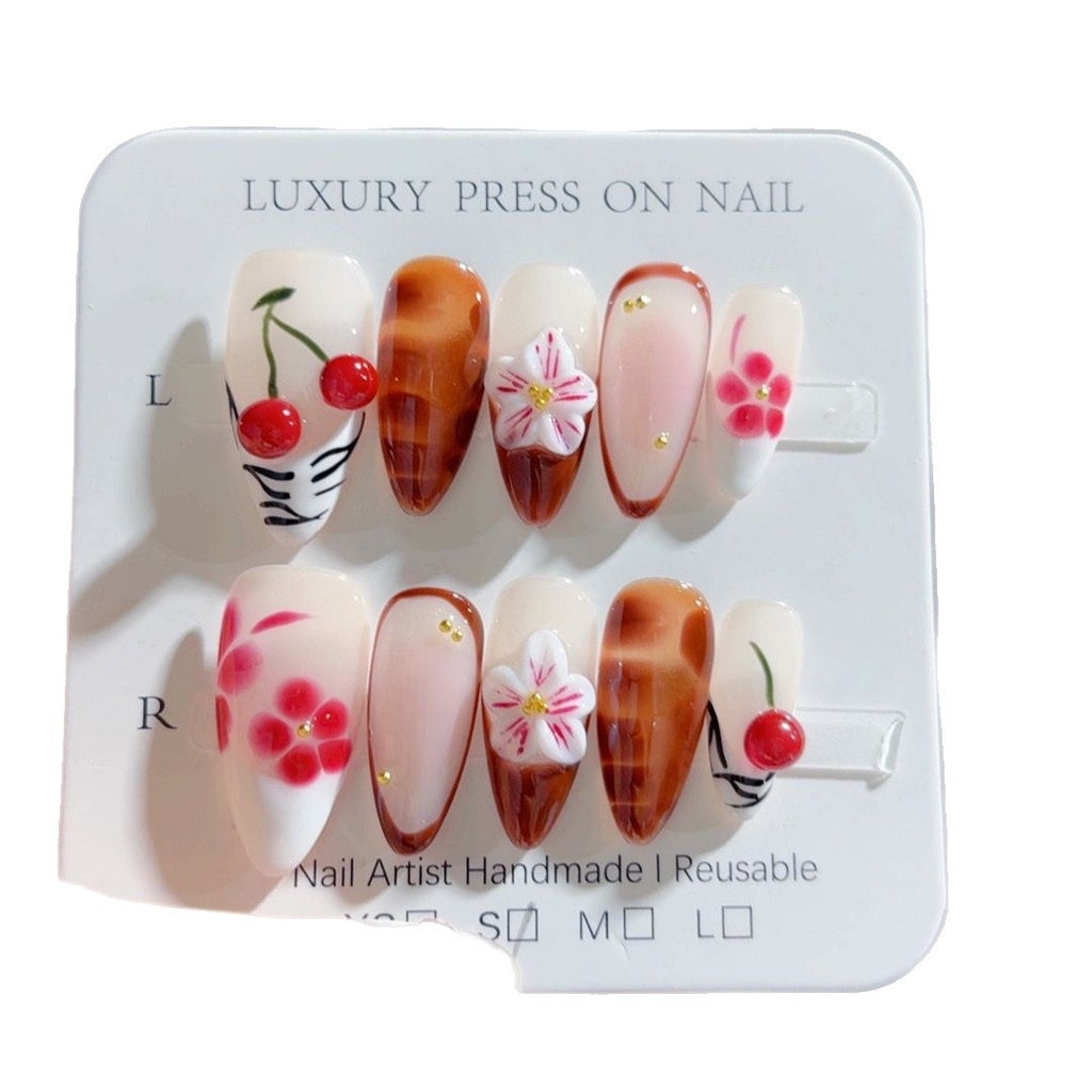 Mandel-Nägel mit Kirschblüten-Design