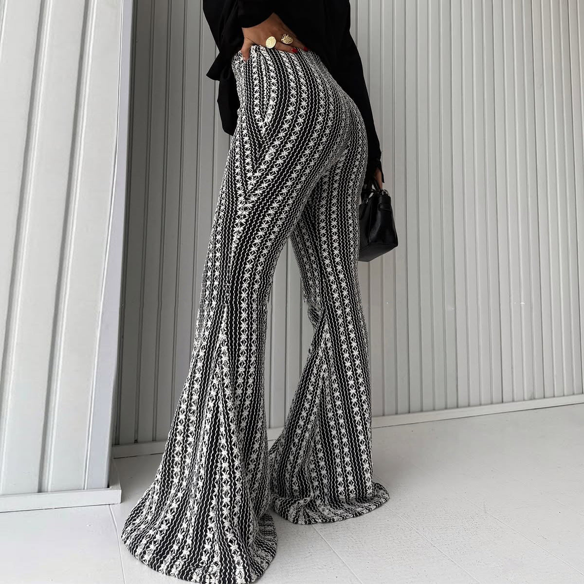 Gestreifte Mid-Rise Stretch Flare Leggings