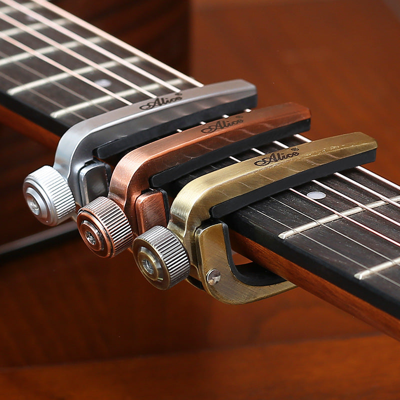 Kapodaster für Folk- und E-Gitarren – Bild 9 | LuxeStyle
