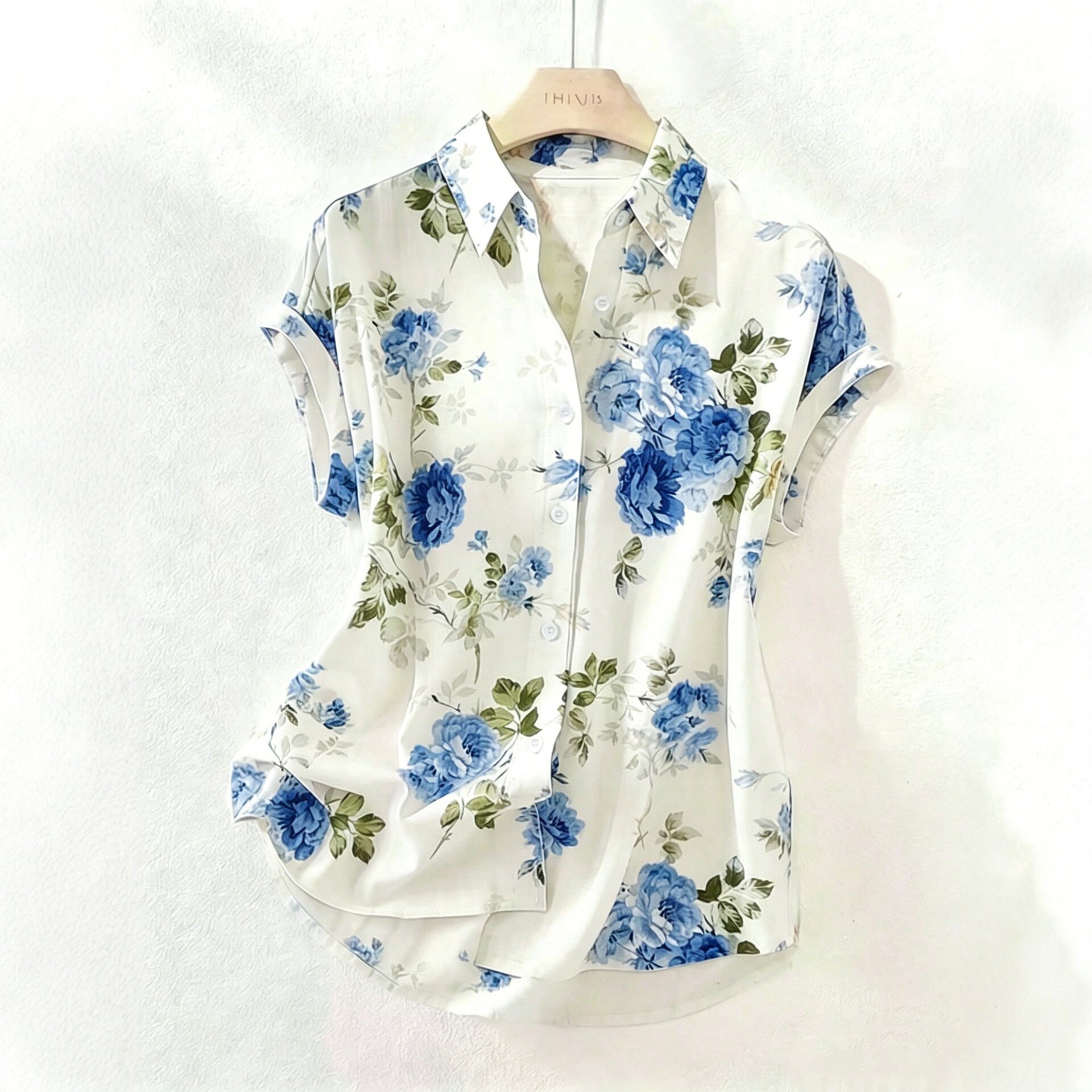 Bluse mit Blumenmuster und Reverskragen