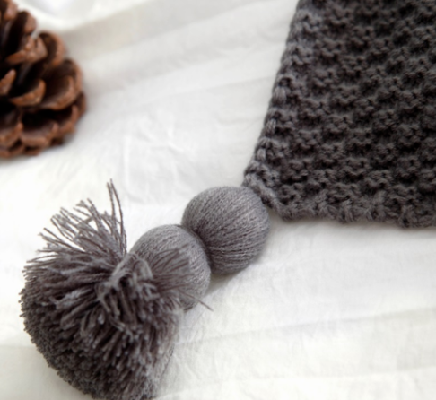 Nordische Fransen-Strickdecke