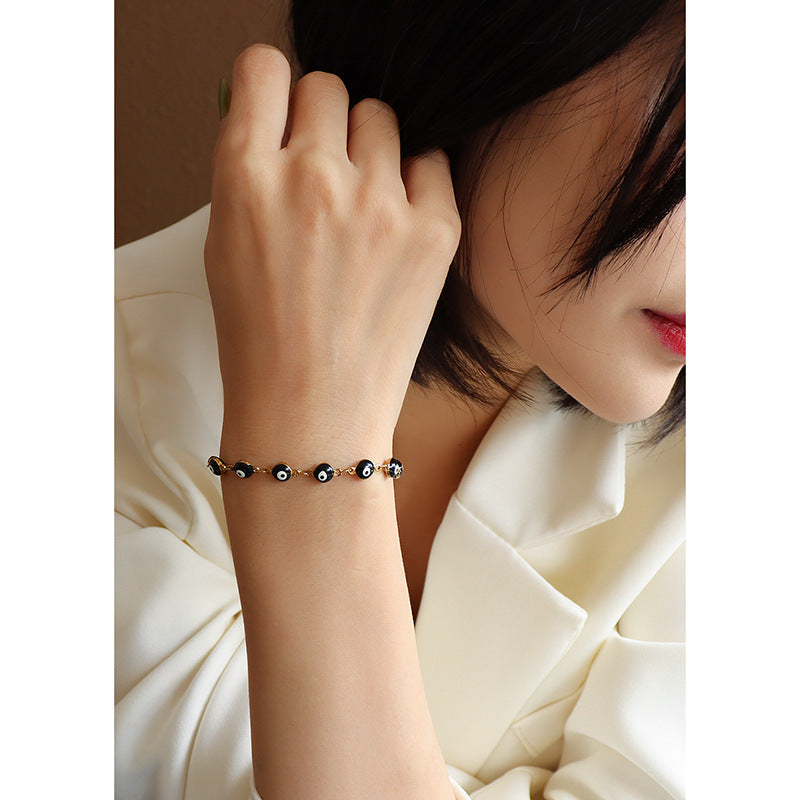 Schwarzes Öl-Tropfen-Armband aus Titanstahl für Damen – Bild 5 | LuxeStyle