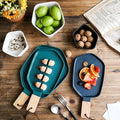 Keramik-Teller mit Holzgriff – Bild 1 | LuxeStyle