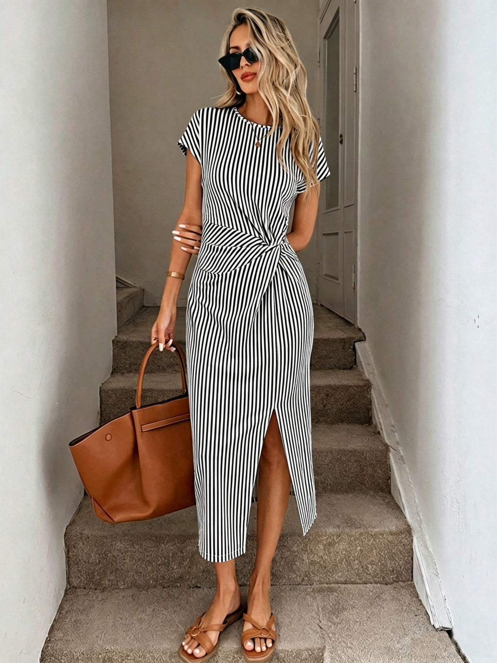 Elegantes, tailliertes Midi-Kleid mit Schlitz