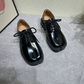 Schwarze Leder-Schuhe mit Kurzabsatz
