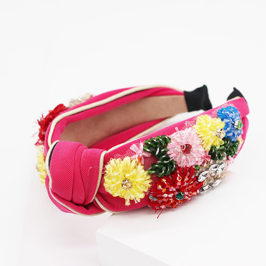 Haarband mit geometrischem Blumenmuster