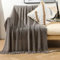 Gestrickte Sofadecke mit Quasten | LuxeStyle