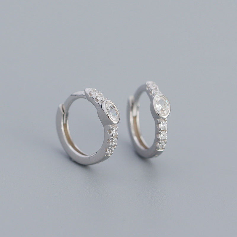 Diamantbesetzte Creolen
