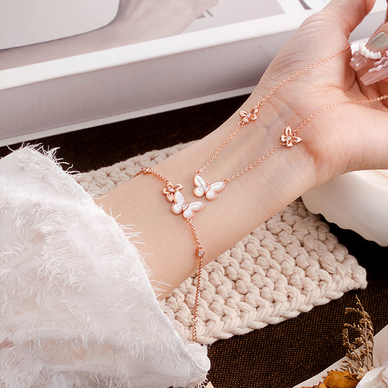 Weiße Perlen-Schmetterlings-Armband