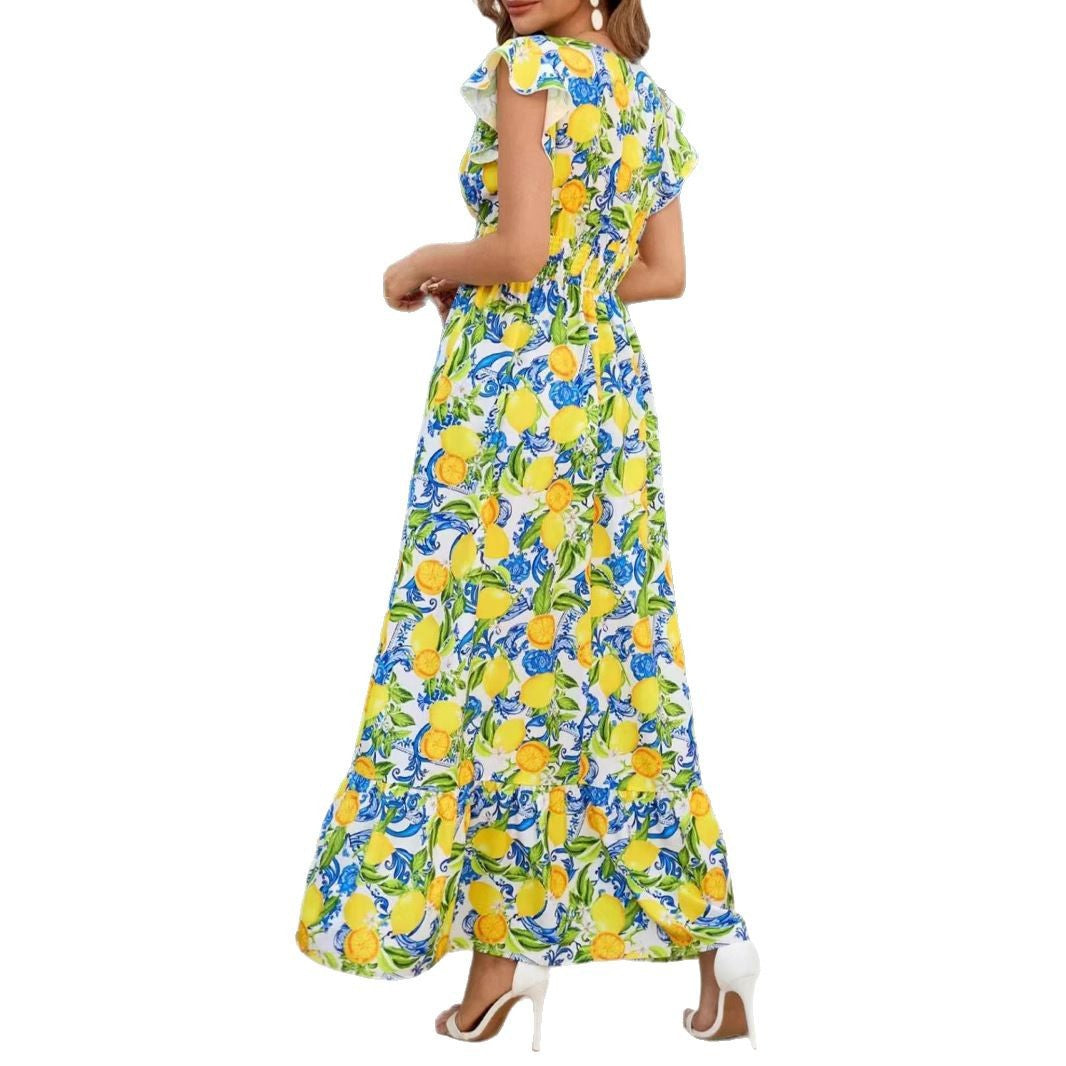 Türkises Kleid mit Zitronenmuster