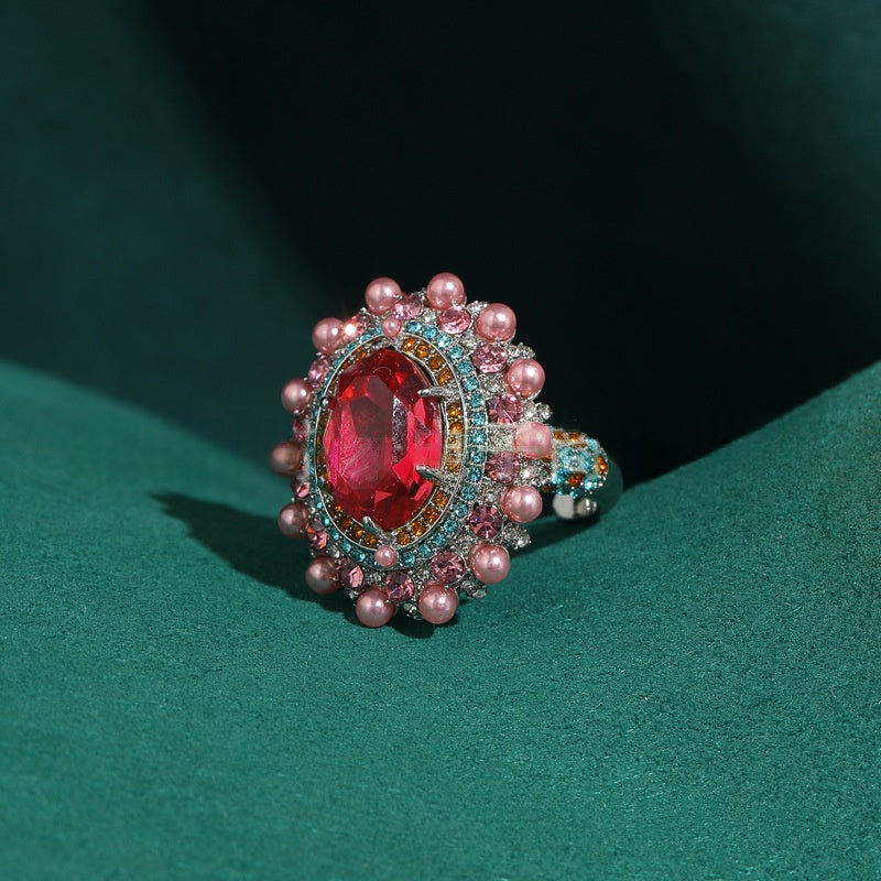Vintage-Ring mit rotem Kristall und Achat