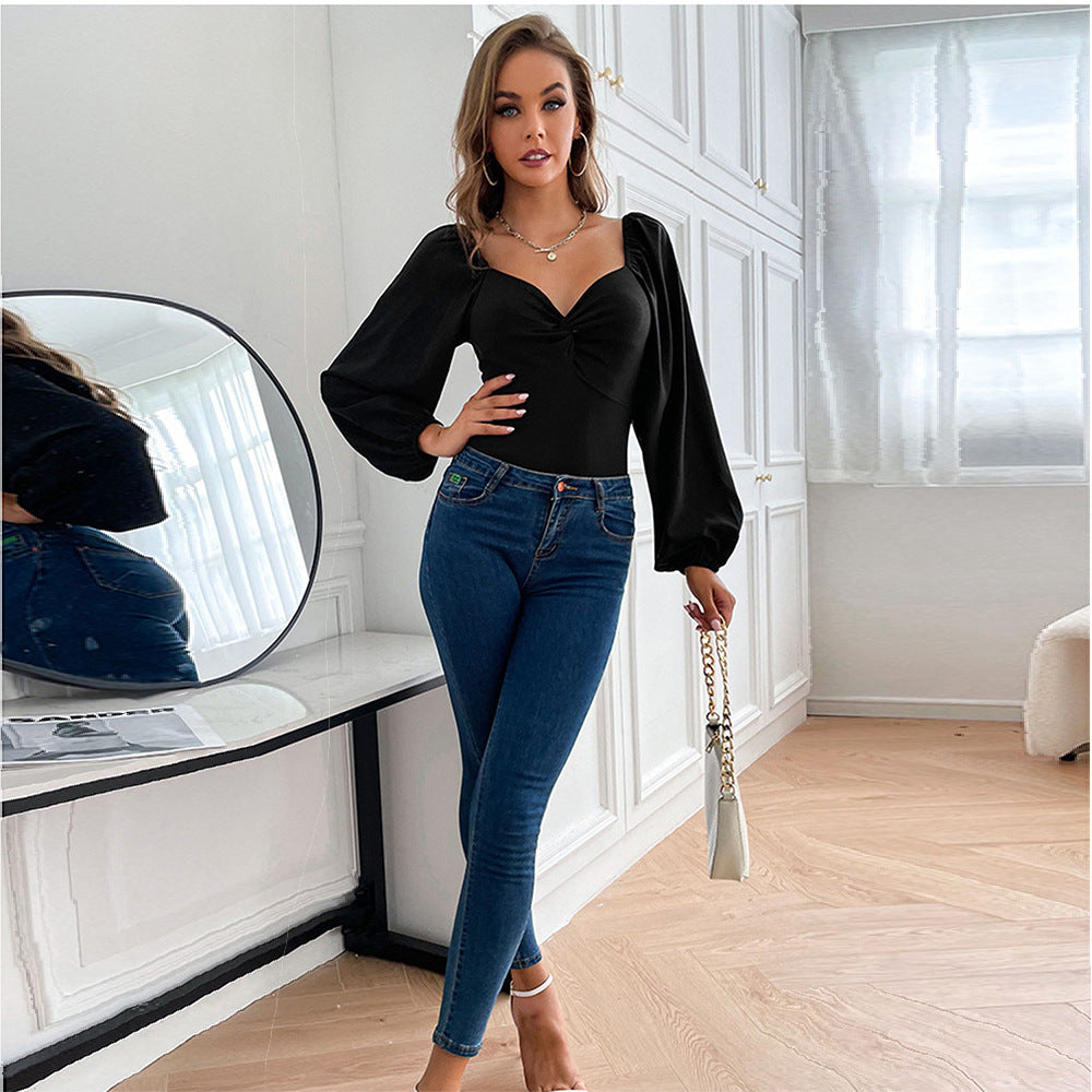 Taillierter Jumpsuit mit langen Ärmeln