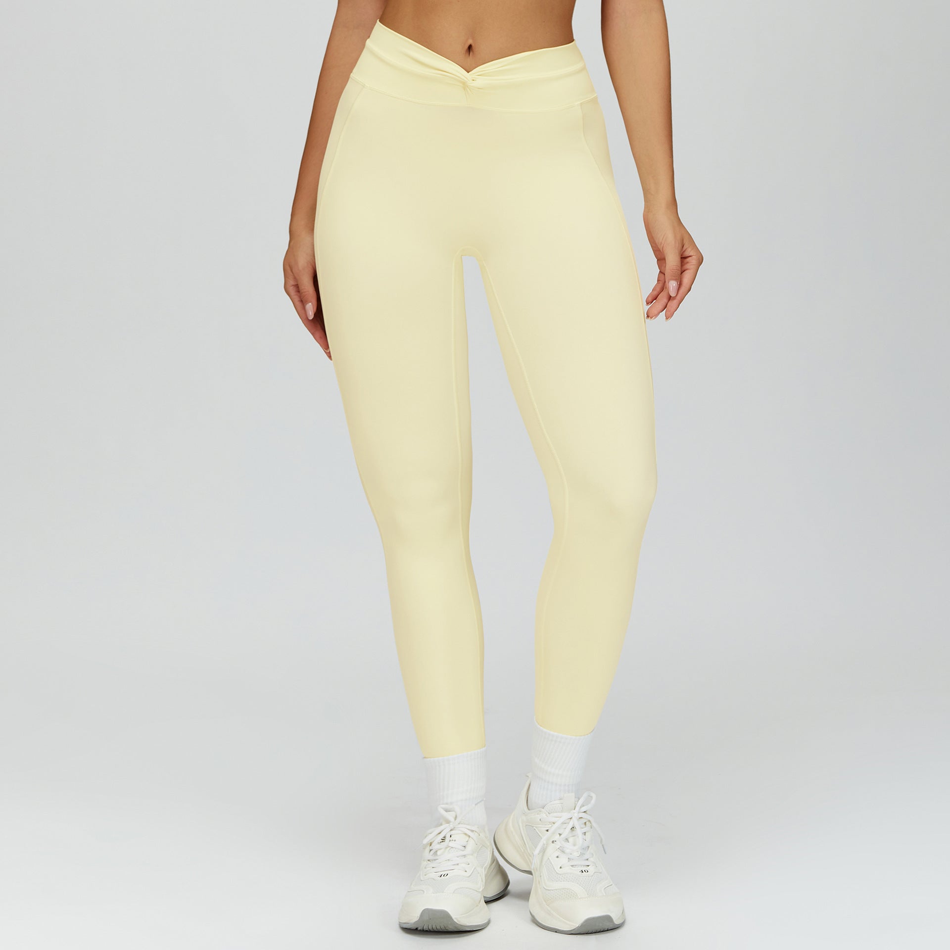 High-Waist Fitnesshose mit gedrehten Falten