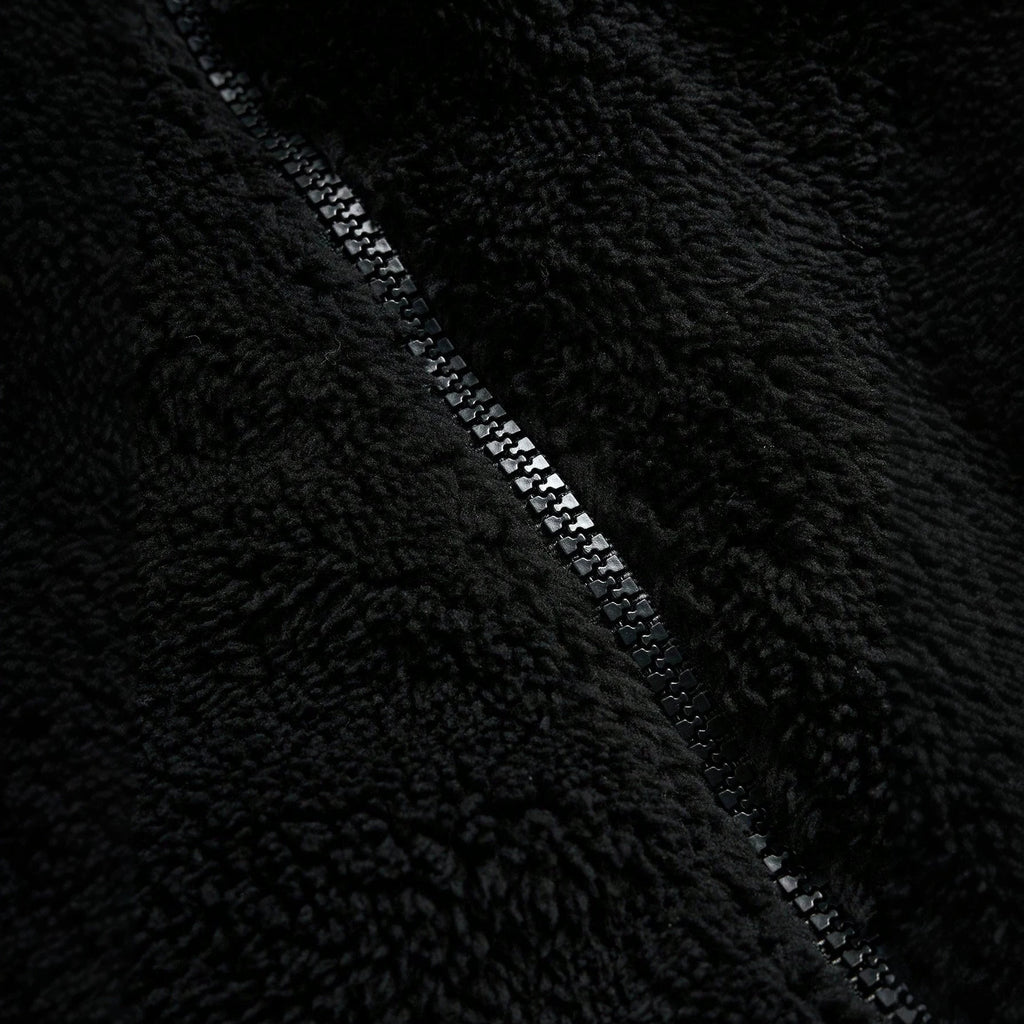 Schwarze Felljacke mit Reissverschluss