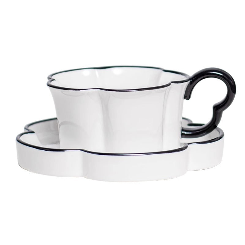 Vintage Tasse mit Untertasse, schwarz-weiss floral