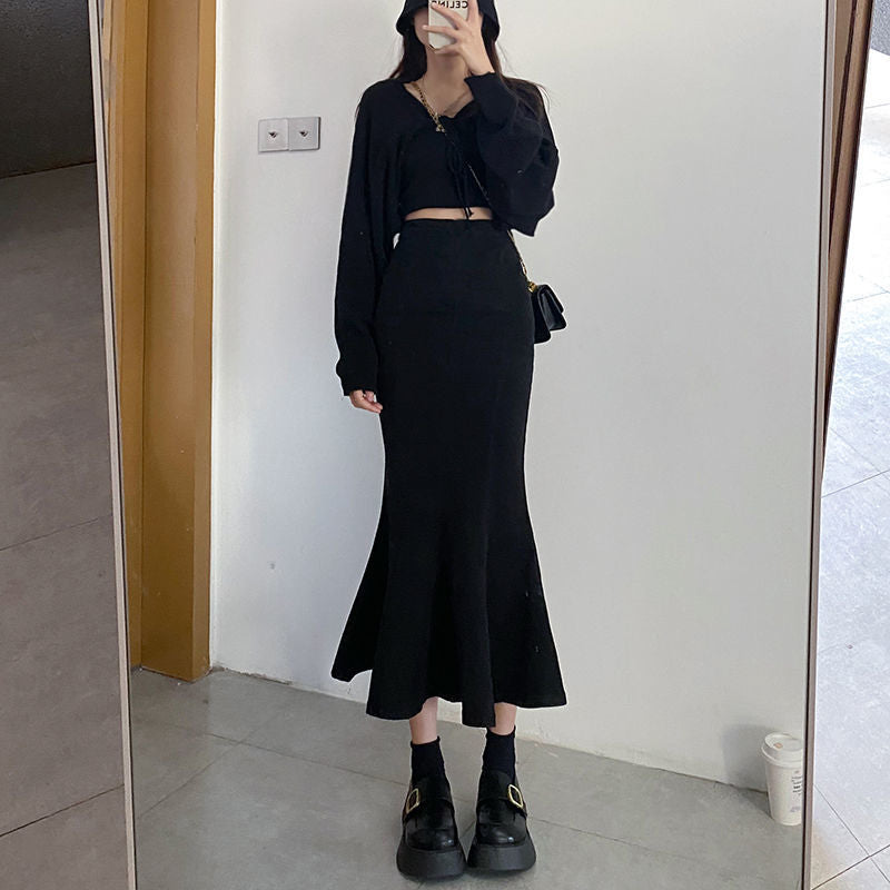Elegante, figurbetonte Jupe mit Schlitz