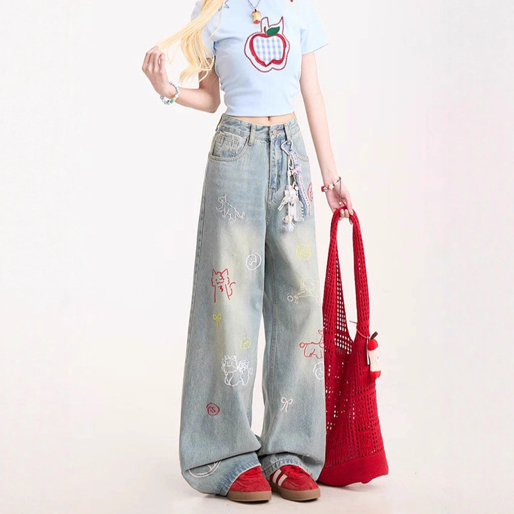 Blaue Jeans mit Cartoon-Stickerei
