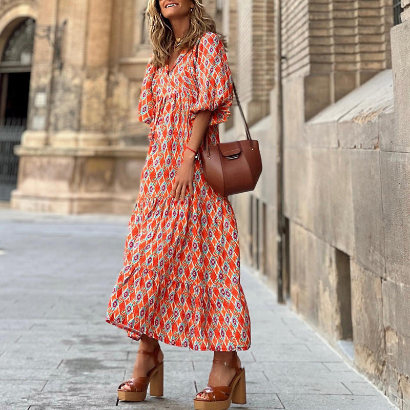 Langes Kleid mit Blumenmuster und Puffärmeln
