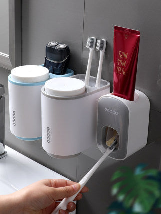 Wandmontierter Zahnpasta-Dispenser