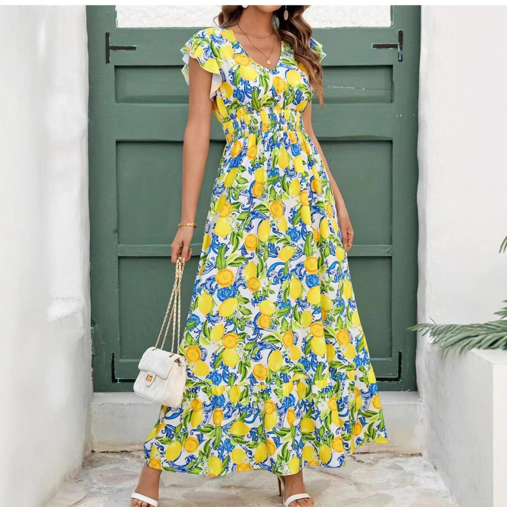 Türkises Kleid mit Zitronenmuster