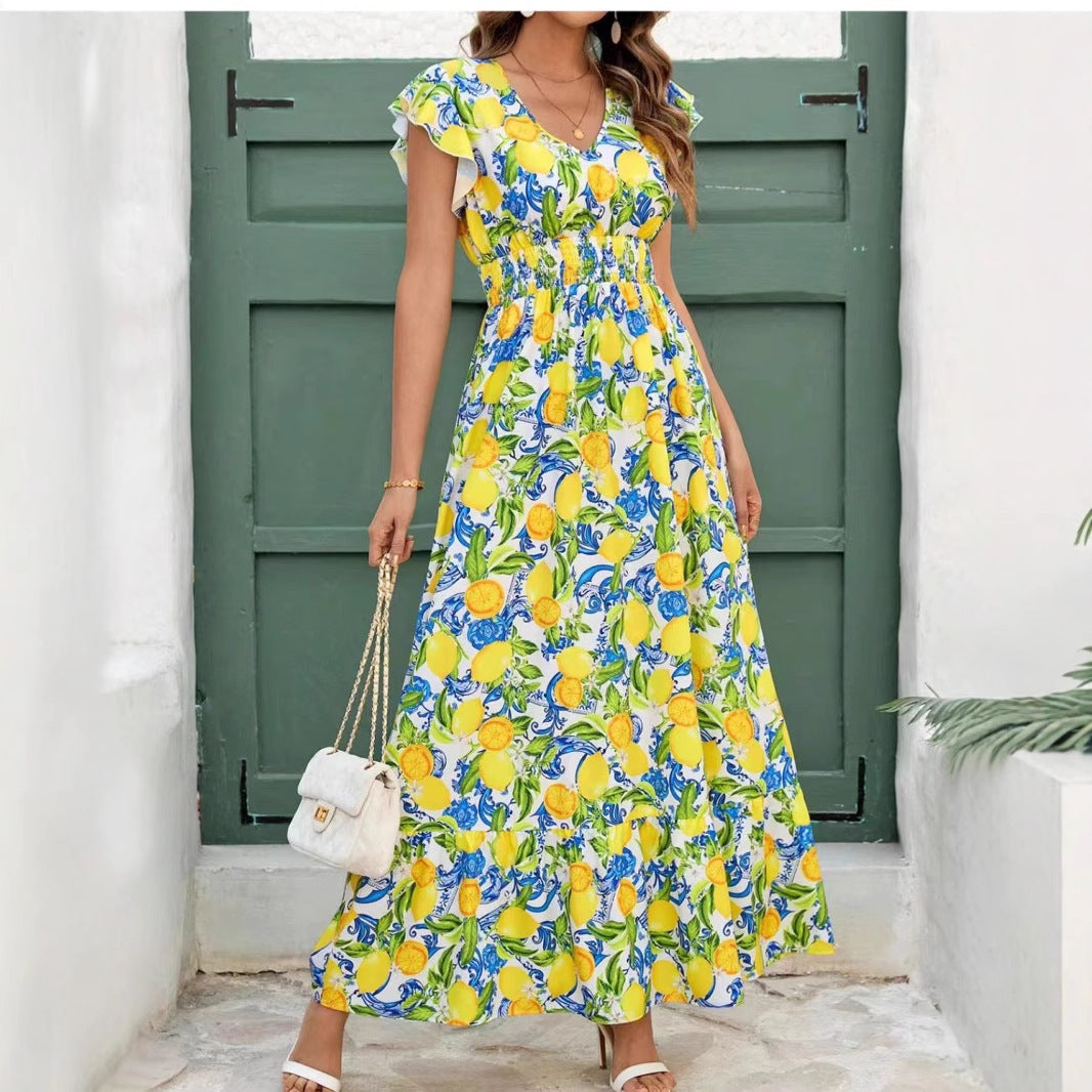 Türkises Kleid mit Zitronenmuster