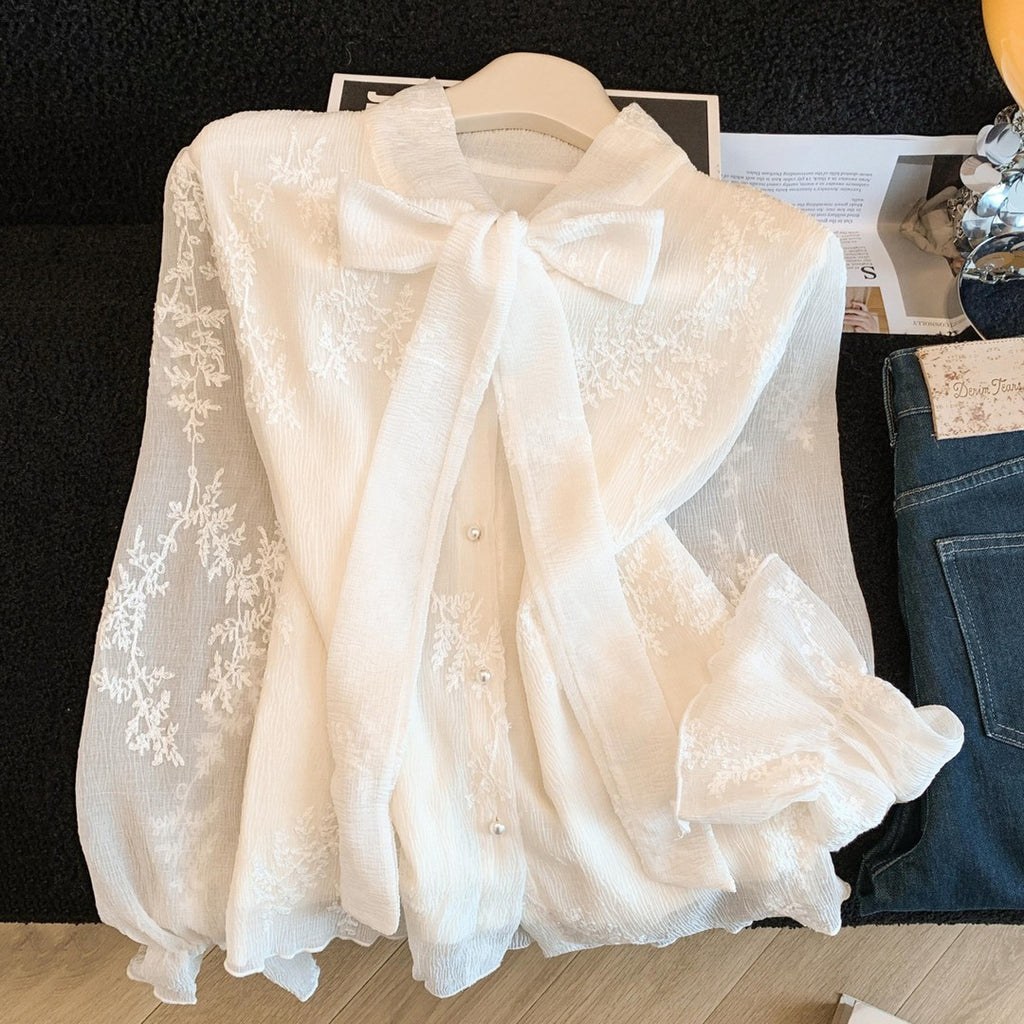 Elegante Jacquard-Bluse mit Schnürung