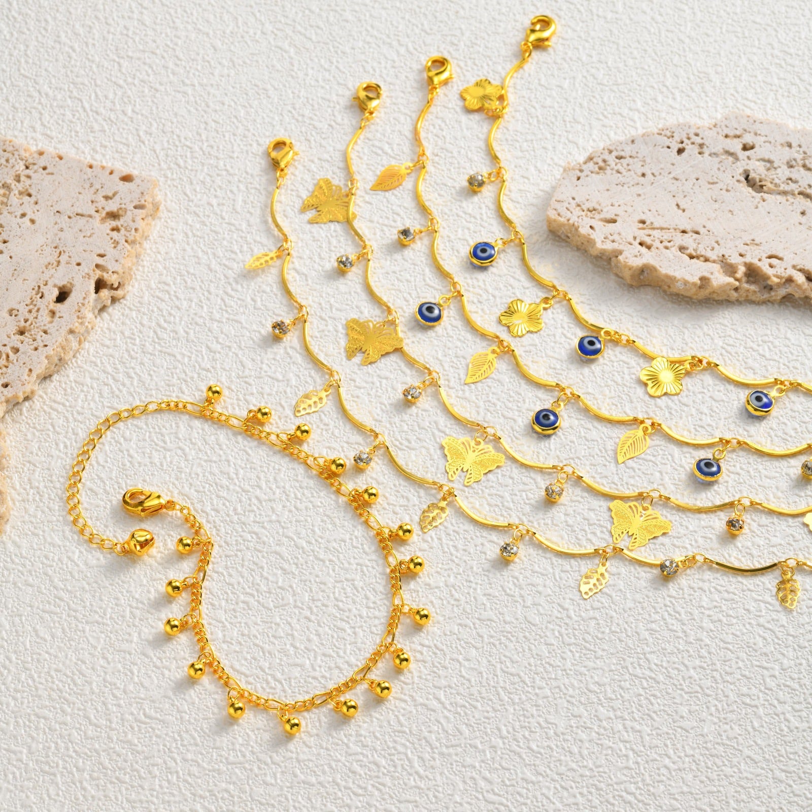 Sommer-Armband «Évil» · Schmetterling & Nazar-Auge, vergoldet