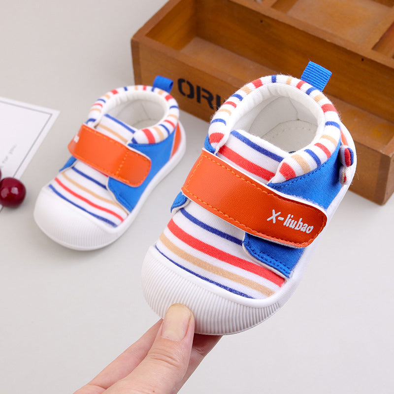 Kleiner Schuh mit Griff und bunten Streifen | LuxeStyle