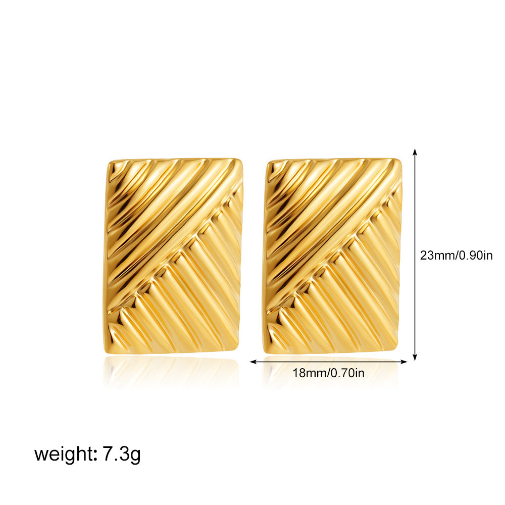 Goldene Streifenohrringe