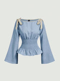 Peplum-Bluse mit Schleifen-Details · Trompetenärmel