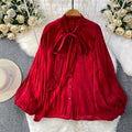 Damen Bluse mit Puffärmeln und Schleife