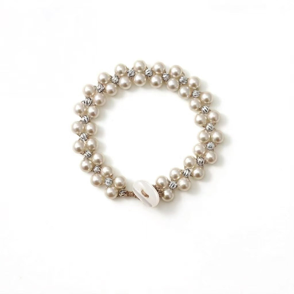 Armband mit grossen und kleinen Imitationsperlen