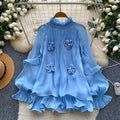 Bluse mit 3D-Blumen und Rüschen