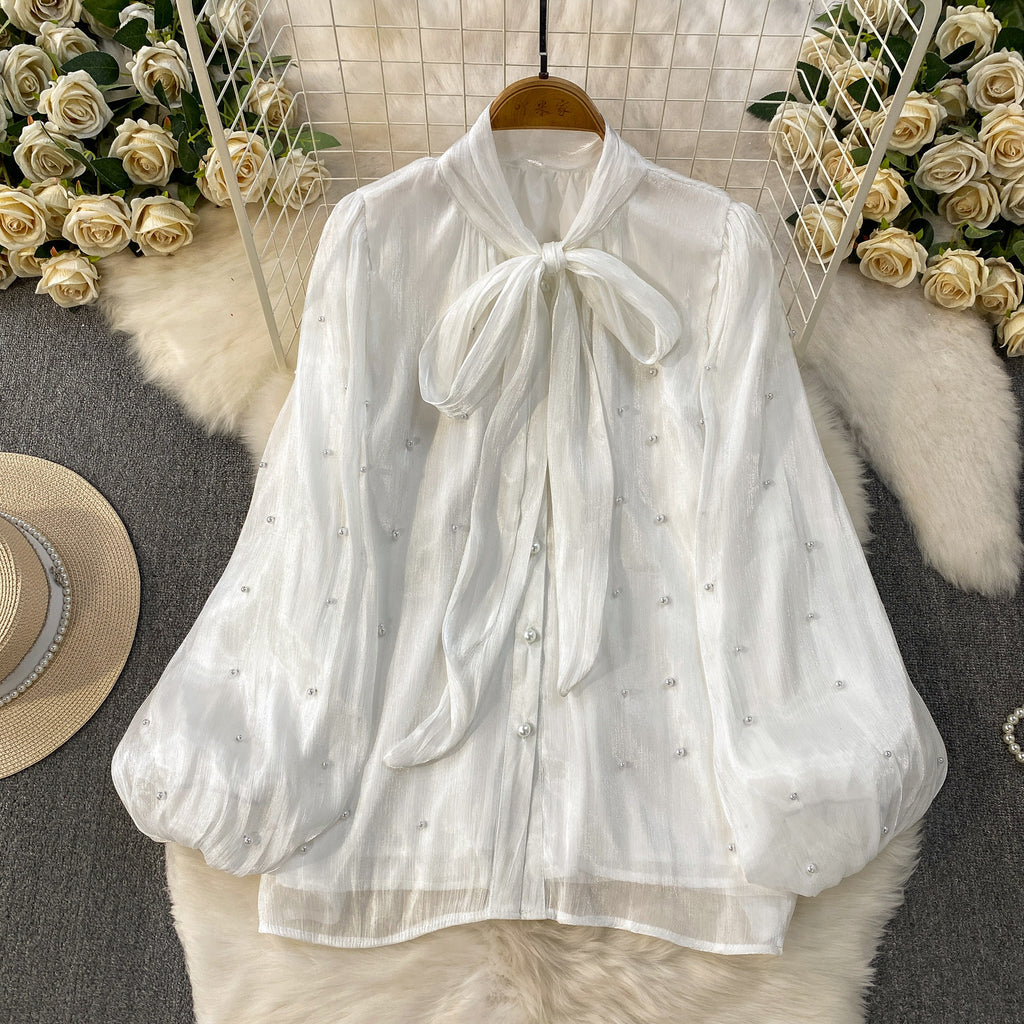 Damen Bluse mit Puffärmeln und Schleife