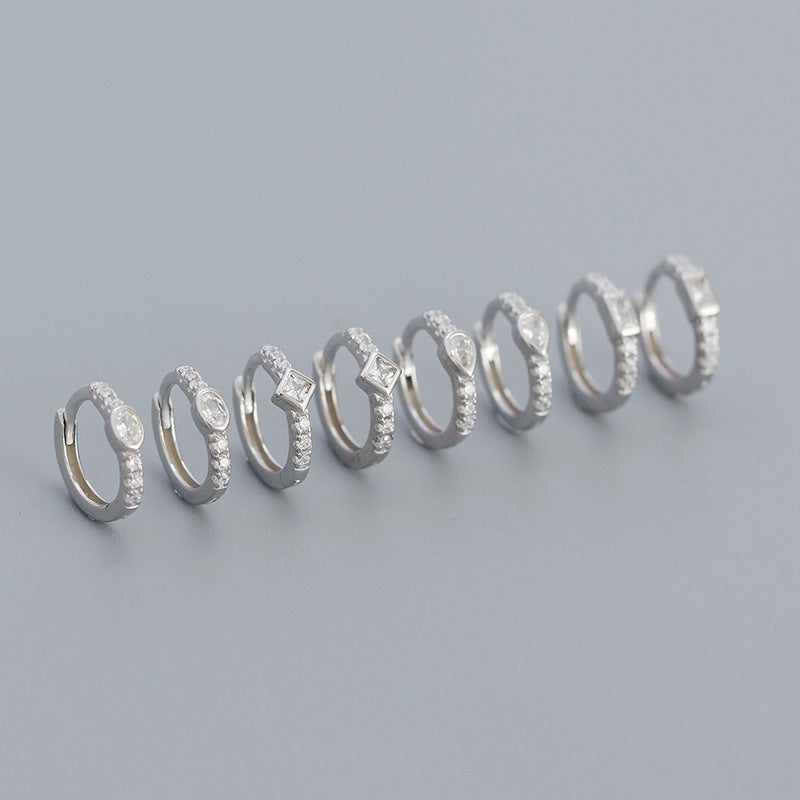 Diamantbesetzte Creolen