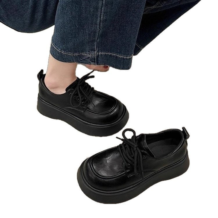 Schwarze Schnürschuhe aus Leder